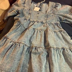 Brand new baby doll dress with tags size M